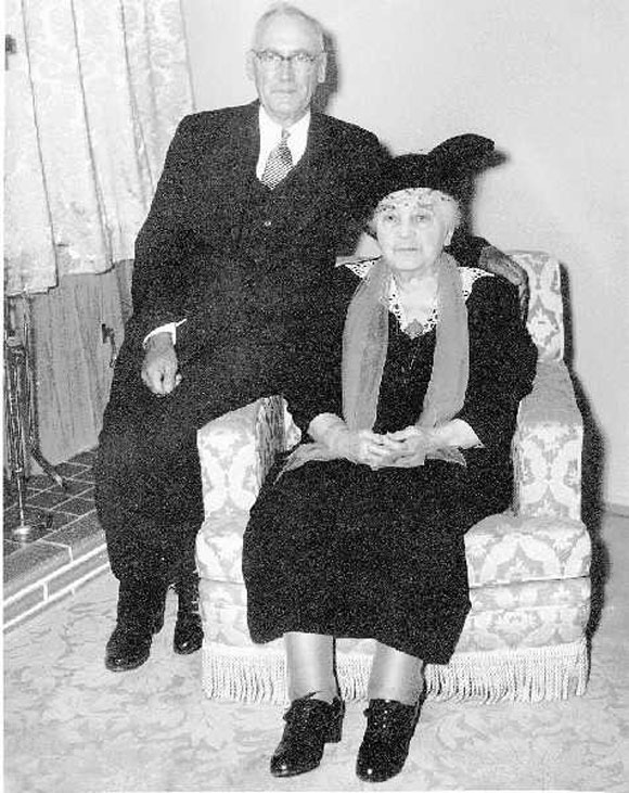 pioneer Barbara Grauer sitting with son Rudy Grauer