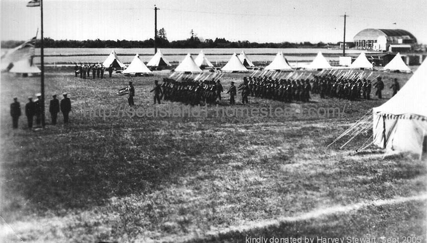 soldiers marching between tents
